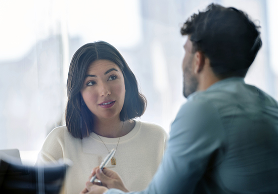 Business colleagues having a conversation.